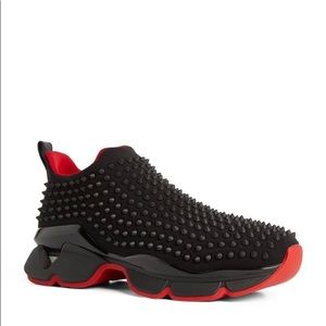 Black shoes with spikes and red insoles